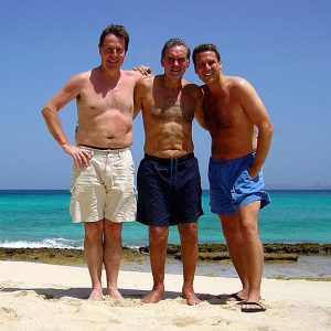 Brian Moody [left], George Best [centre] and Patrick Steel [right] on the island of Mustique.